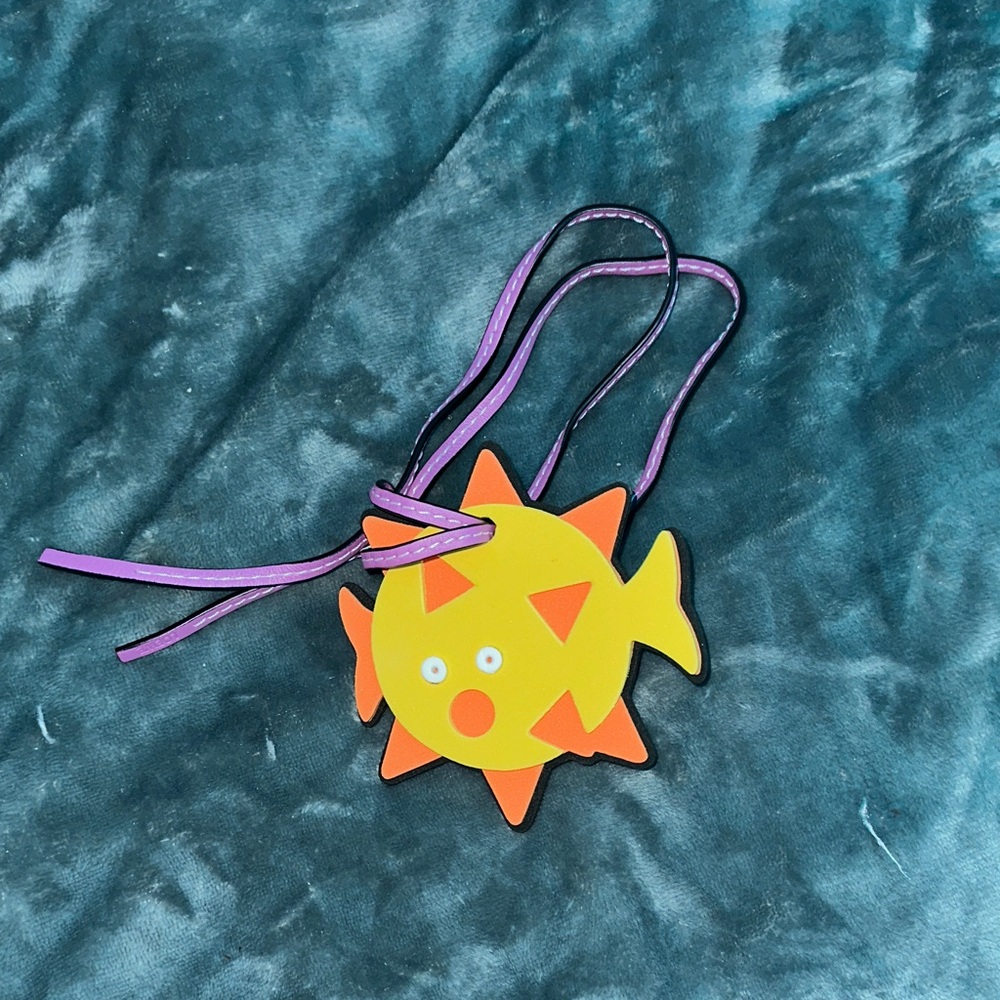 Loewe fish 🐠 charm with purple leather strap